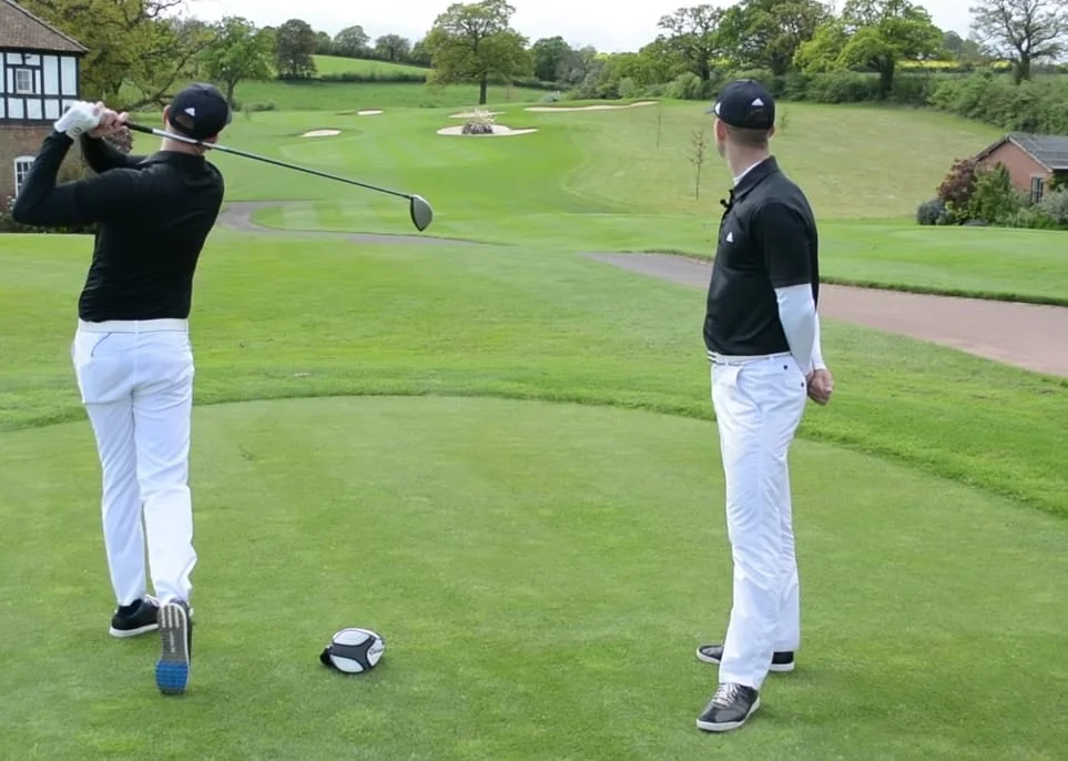 Two golfers testing out new drills to stop pushing the golf ball. stop pushing the golf ball pushing a golf shot a push shot in golf pushing golf shots